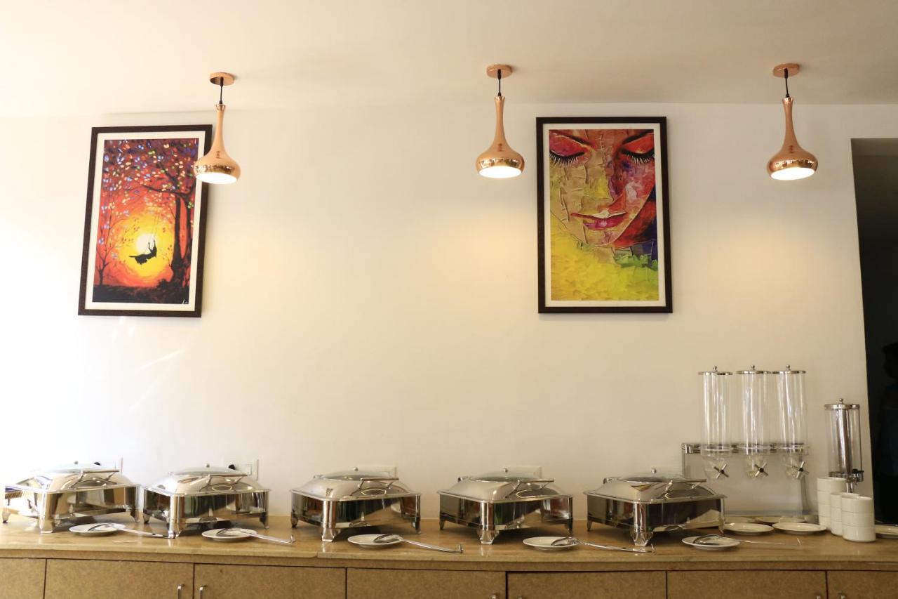 Cosmopolitan Hotels Madurai Buitenkant foto